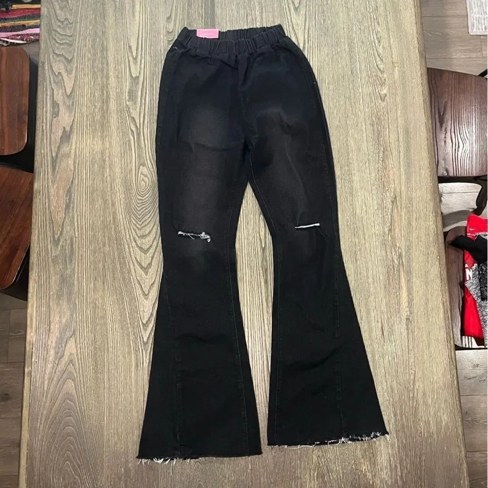 Fashion Flared Pants High Rise Elastic Waist Ripped Knee Raw Hem Black Size S